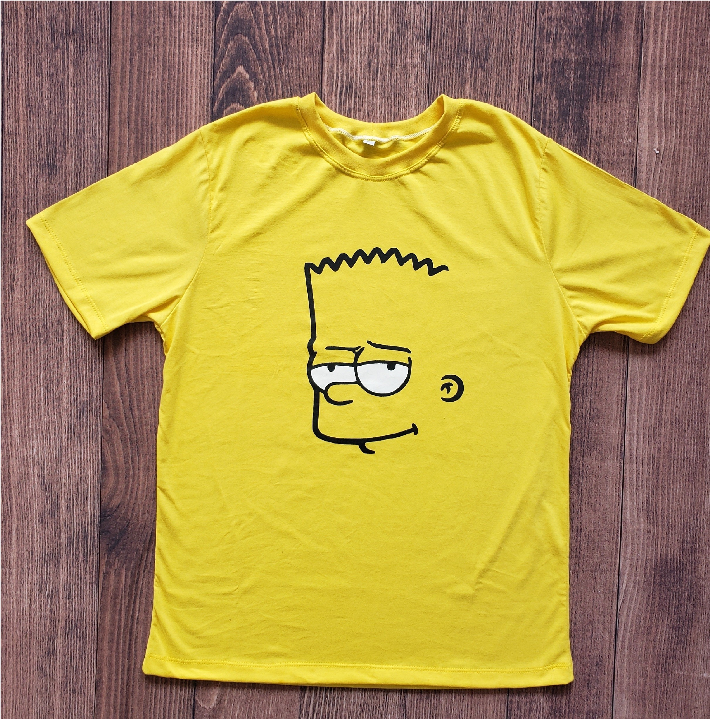 Camiseta Juvenil Amarela Bart Simpson
